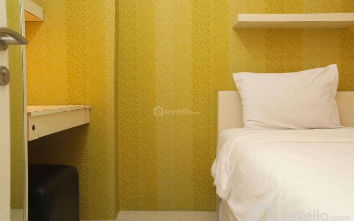 Minimalist and Warm 2BR Bassura City By Travelio
