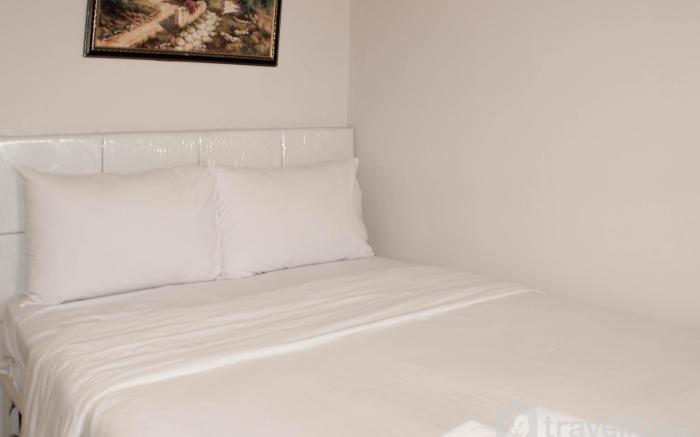 Minimalist Homey 1BR at Bassura City By Travelio