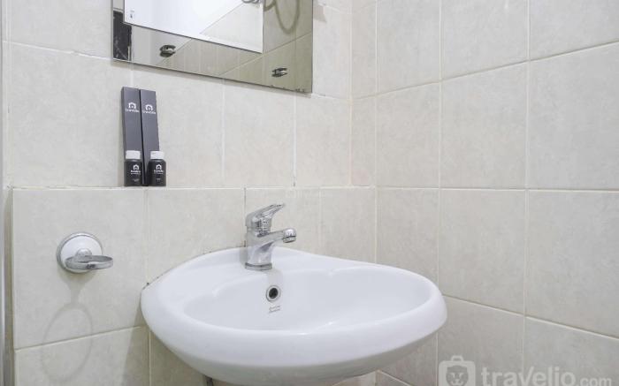 Well Appointed 1BR The Wave Kuningan By Travelio