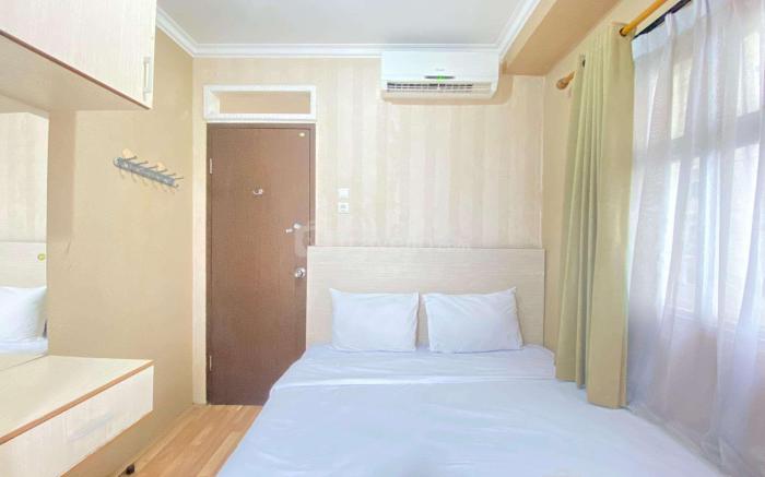 Cozy 2BR Apartment at Suites @ Metro By Travelio