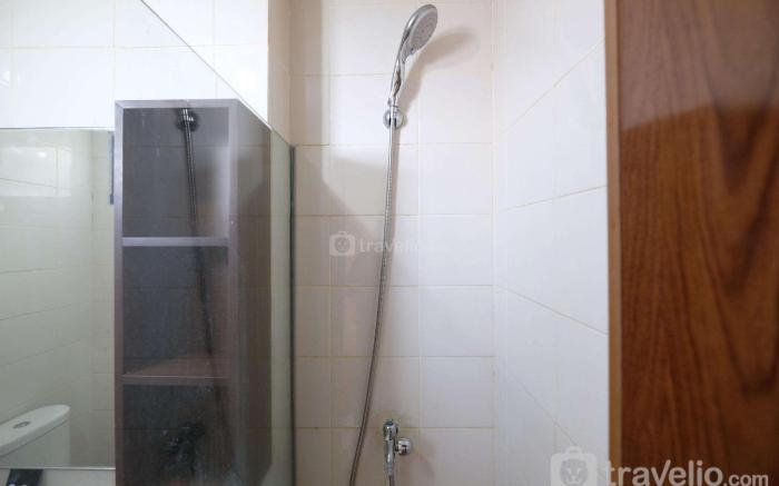 Comfort 2BR at Lagoon Apartment By Travelio