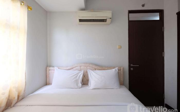Comfort 2BR at Lagoon Apartment By Travelio