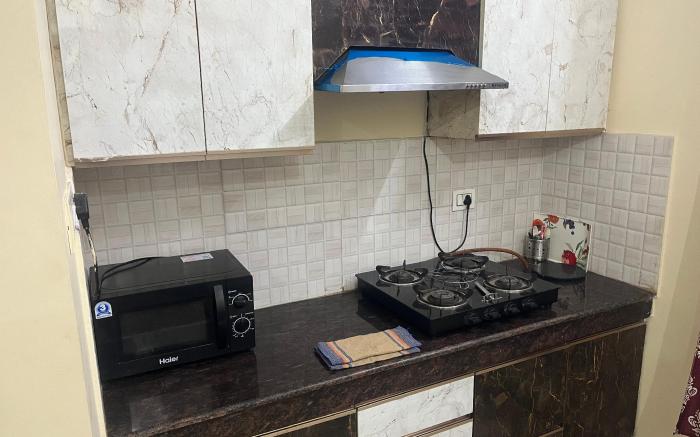 Budget Home stay 1BHK Flat Parking Lift Kitchen