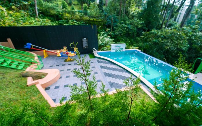 Areva Inn Pool Resort Munnar by VOYE HOMES