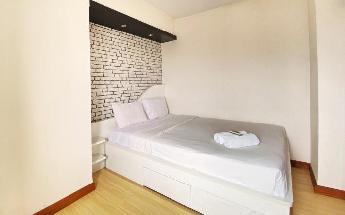 Homey 2BR Gateway Ahmad Yani Cicadas By Travelio