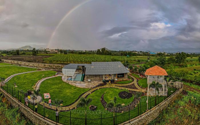 StayVista's Le Ciel - Lakeside Retreat Amidst Farmland with Pool, Indoor Activities, Lawn, Bonfire P