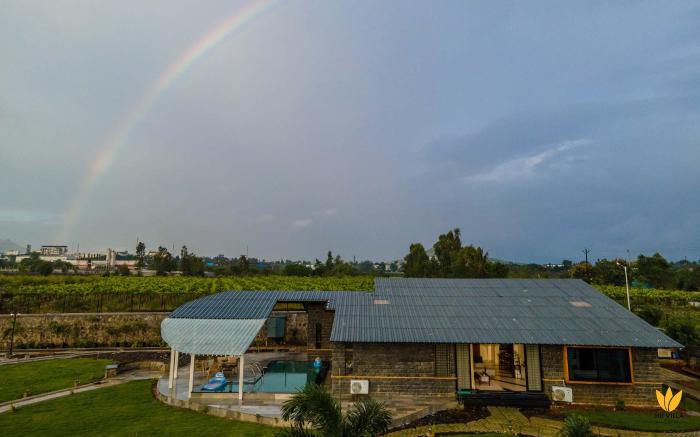 StayVista's Le Ciel - Lakeside Retreat Amidst Farmland with Pool, Indoor Activities, Lawn, Bonfire P