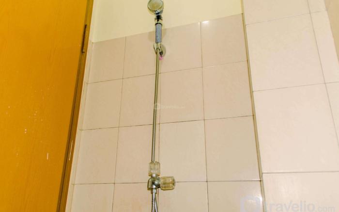 Homey and Warm Studio Room at Tifolia By Travelio