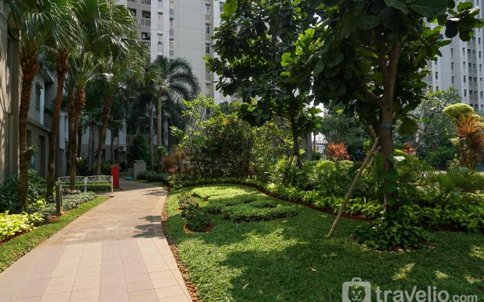 Large 2BR Green Bay Pluit Sea View By Travelio