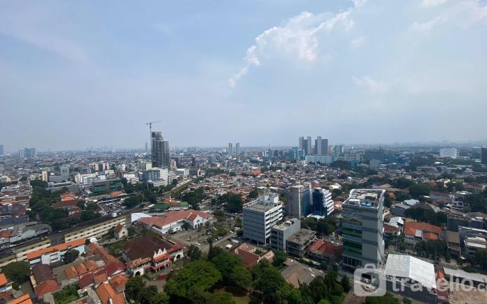 Elegant 2BR at 26th Floor Menteng Park By Travelio