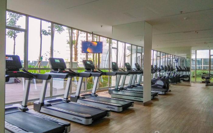 Exclusive and Cozy 1BR at Gold Coast By Travelio