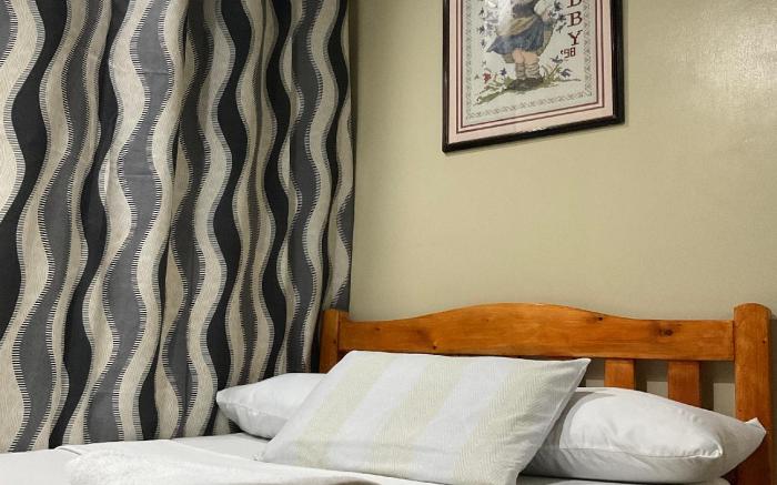 Myra’s Affordable Condo w Bedroom & Free WiFi