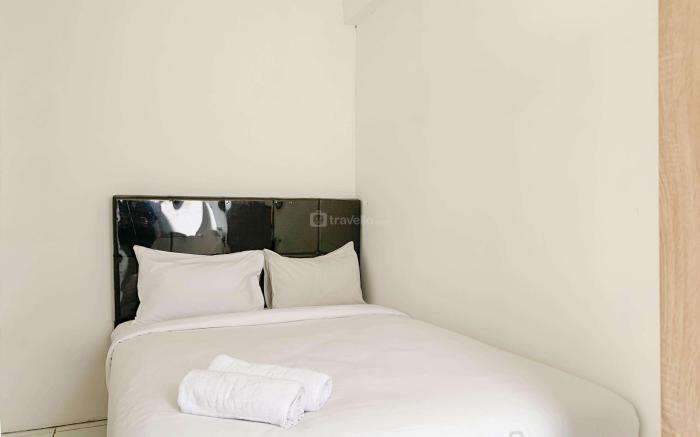 Cozy 2BR at Delta Cakung Apartment By Travelio