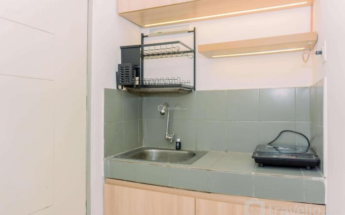 Comfort 2BR at Menara Kebon Jeruk By Travelio
