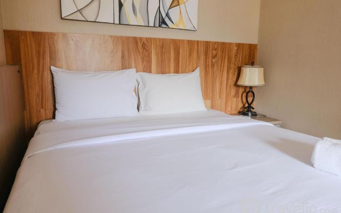 Homey Living 2BR Parahyangan Residence By Travelio