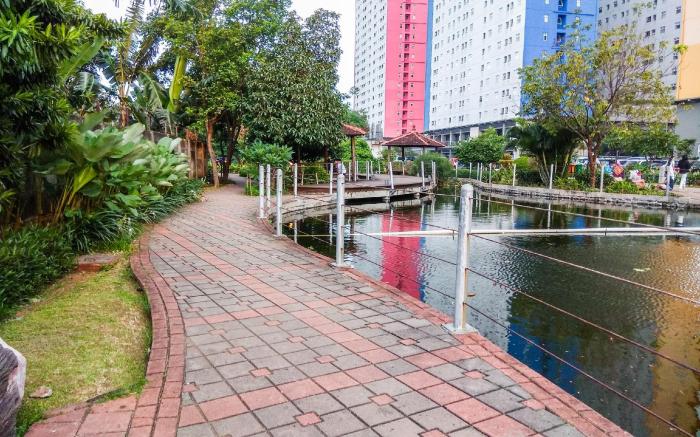Well Design 2BR at Green Pramuka City By Travelio