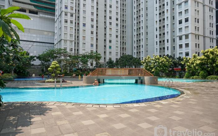 Warm & Minimalist 2BR Green Bay Pluit By Travelio