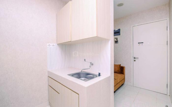 Cozy 1BR at Sentul Tower Apt By Travelio