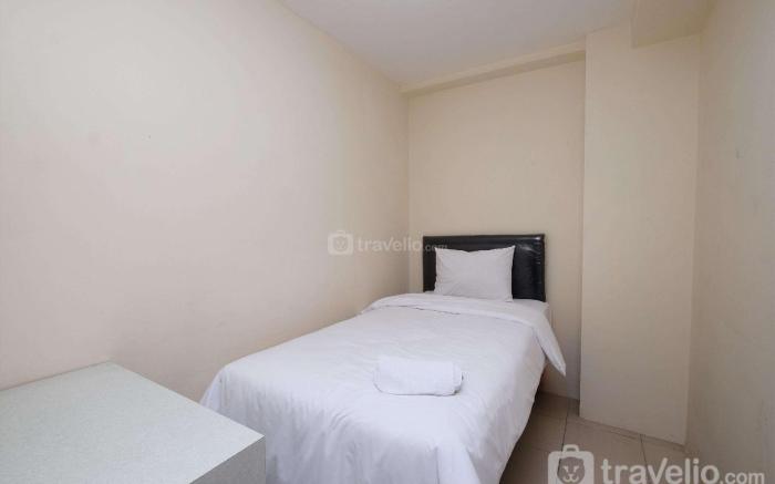 Comfy Elegant 2BR Tifolia Apartment By Travelio