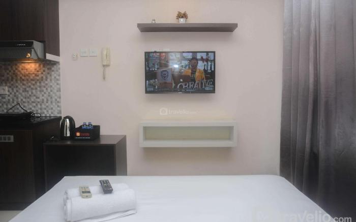 Minimalist Studio Grand Dhika City By Travelio