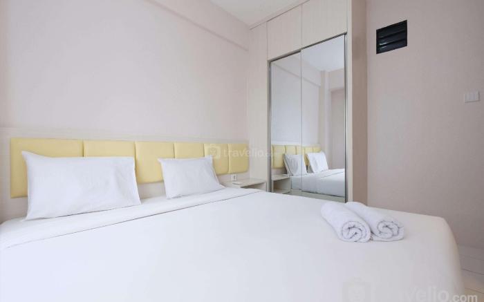 Comfort 2BR Apt at Podomoro Golf View By Travelio