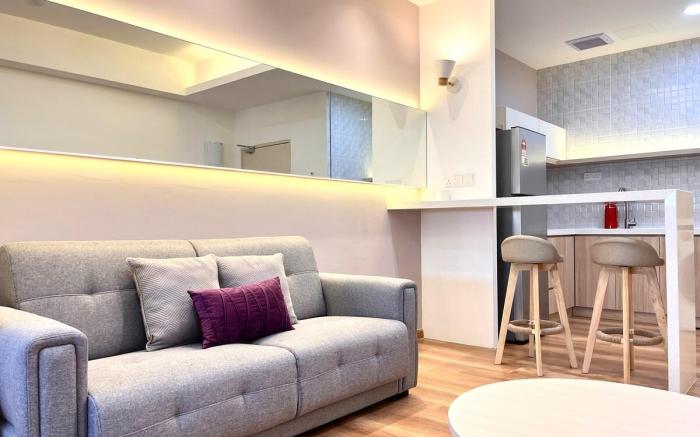 Urban Vista: City Center Retreat with InfinityPool