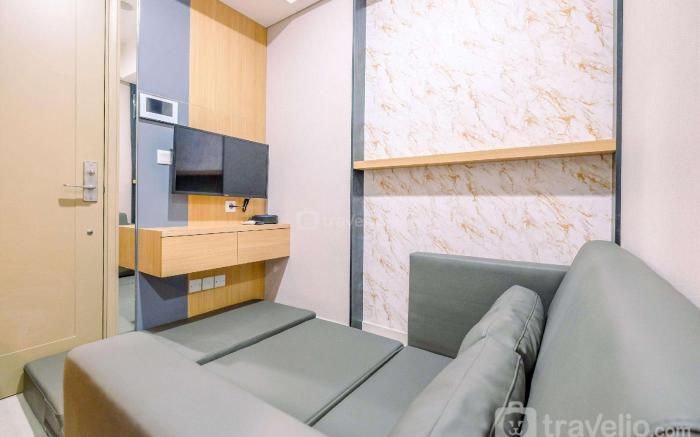 Comfort and Modern 1BR at Gold Coast By Travelio