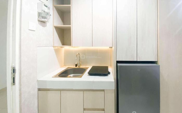 Elegant & Homey Studio at Amartha View By Travelio