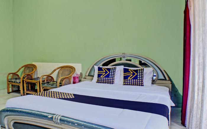 SPOT ON 92682 Badar Guest House Syariah