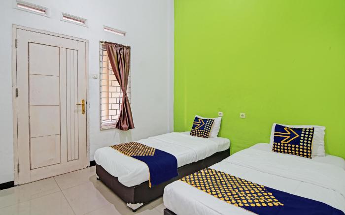 SPOT ON 92801 Penginapan Puti Syariah