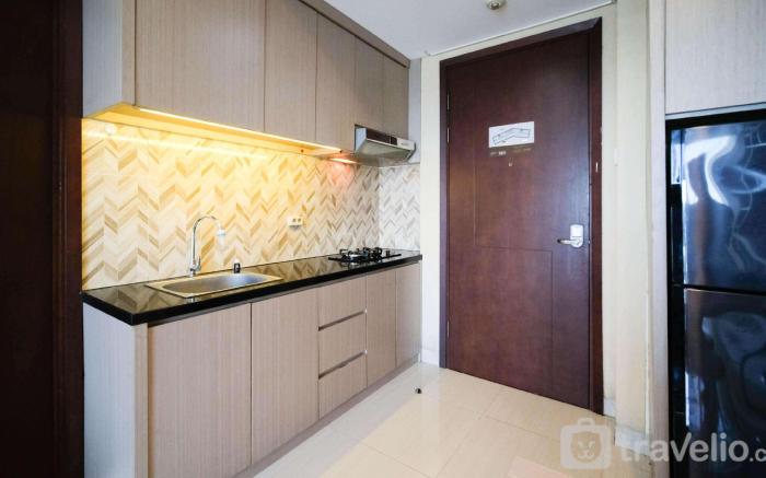 ModernCozy 1BR Grand Sungkono Lagoon By Travelio