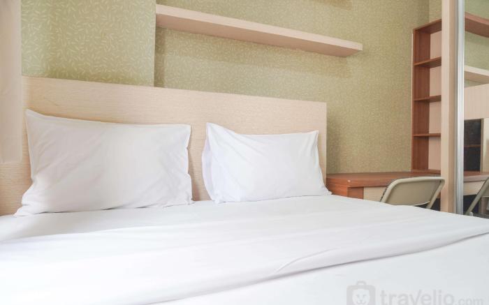 Cozy Stay 1BR at Green Pramuka City By Travelio