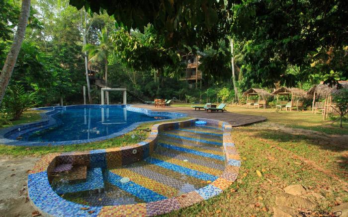Jungle Village by Thawthisa