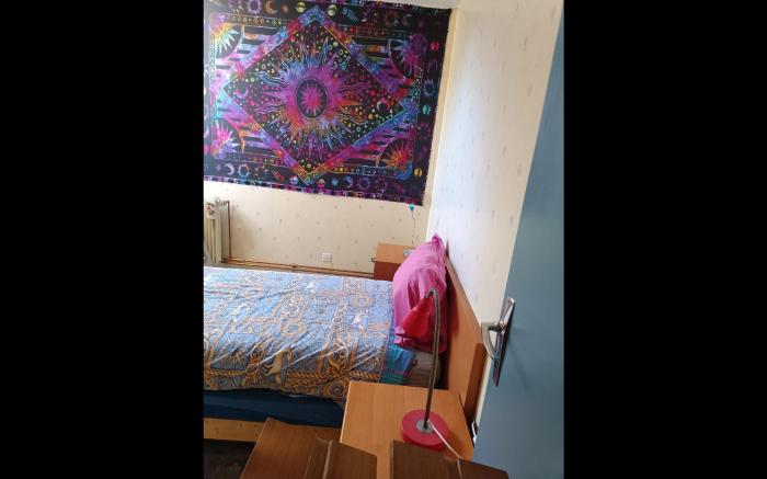 Single bed with a large desk