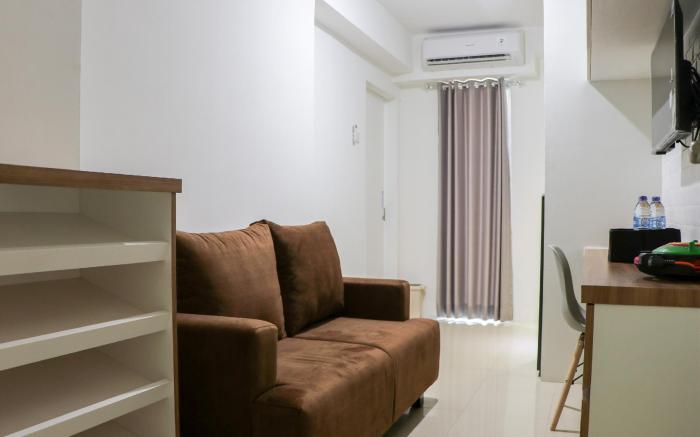 Minimalist & Warm 1BR at Bassura City By Travelio