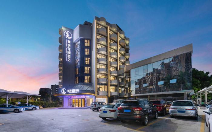 Qingyu Garden Hotel (Haiya Binfeng Cheng Tongle South Metro Station)