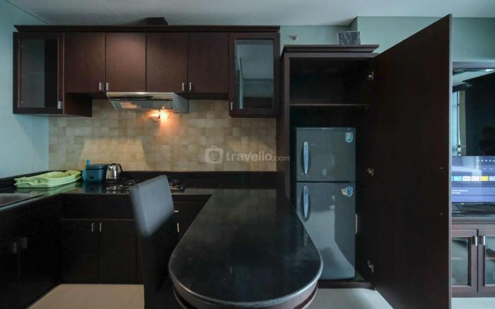 Homey 1BR at Aryaduta Residence Apt By Travelio