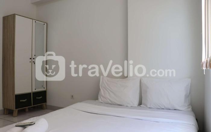 Cozy 2BR at Mekarwangi Square Apt By Travelio