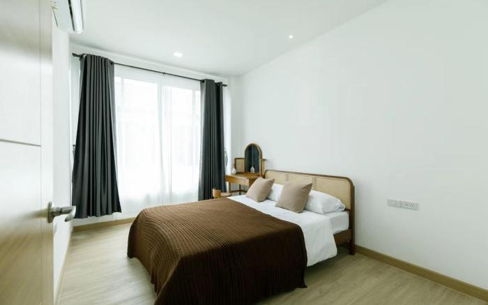 d village condominium