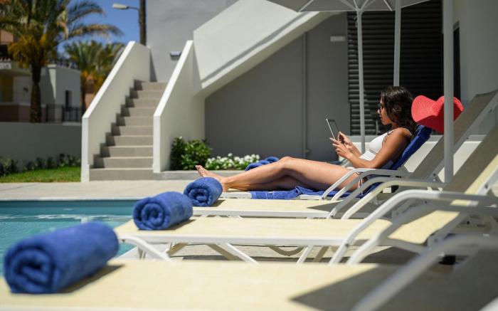Athina Suites | 1BD chic apartments w/shared pool