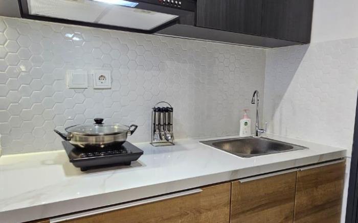 cozy and fully furnished Collins Apartemen