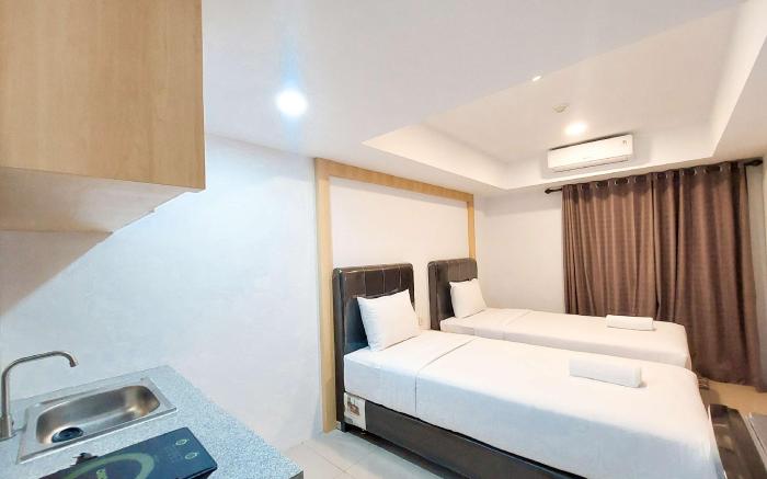 Homey and Comfy Studio at De Prima By Travelio