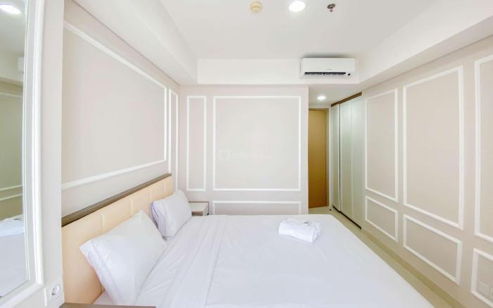 Well Furnished 1BR Gold Coast Apt By Travelio