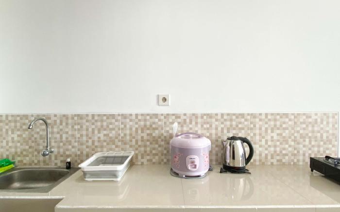 Best Homey Studio at Enviro Apartment By Travelio