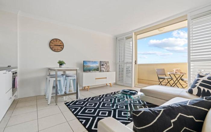 Top Floor Apartment with Balcony in Great Location