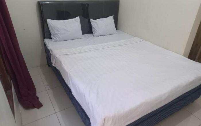 SPOT ON 93815 Chimi Rumah Kost