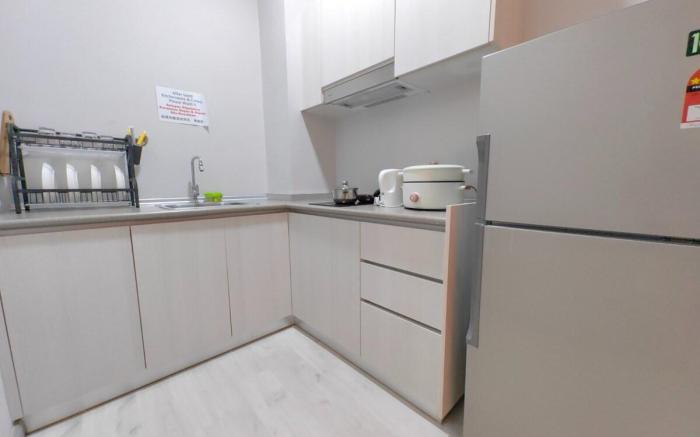 L Homestay Jesselton Quay KK City 14th, near Gaya Street and the Jetty.