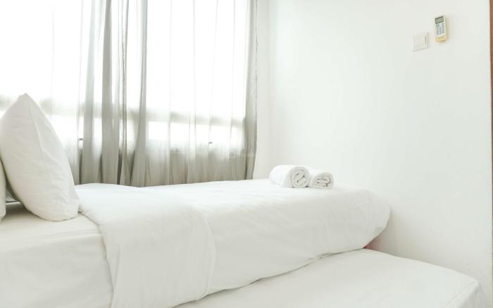 Modern Look 2BR at Springhill Terrace By Travelio