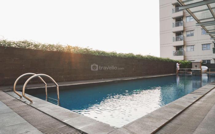 Minimalist 1BR Belmont Residence Puri By Travelio