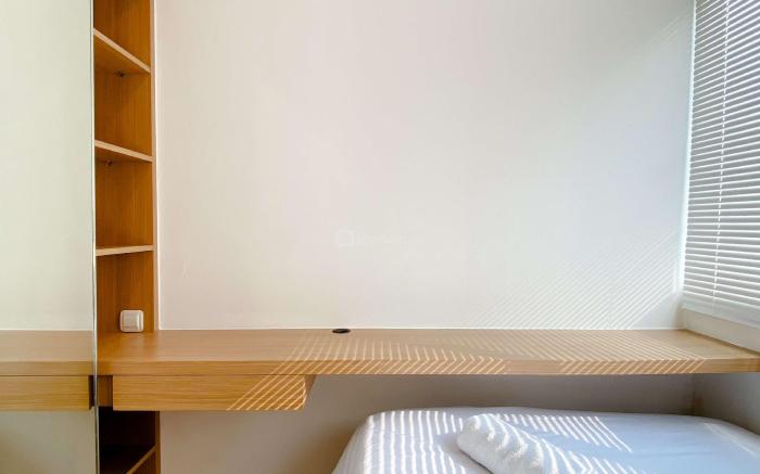 Homey 2BR with Work Space at Meikarta By Travelio
